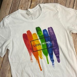 Love Wins T-shirt - rainbow paint themed design that says “love wins”
